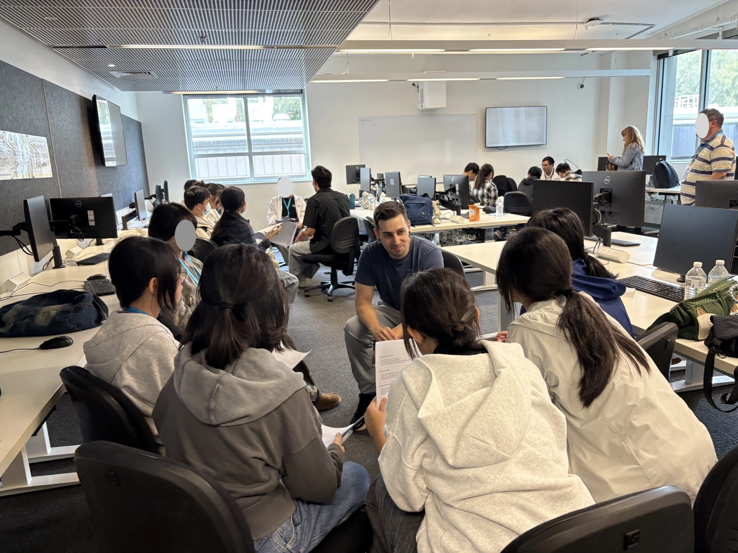 Students presenting a finished AI project on a tablet